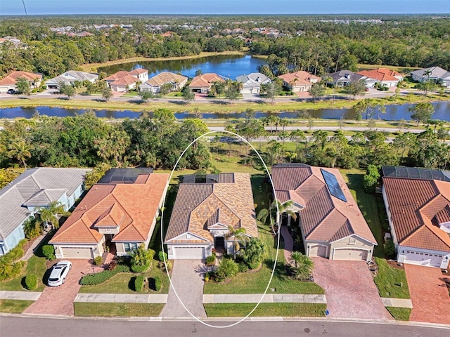 bird's eye view with a water view