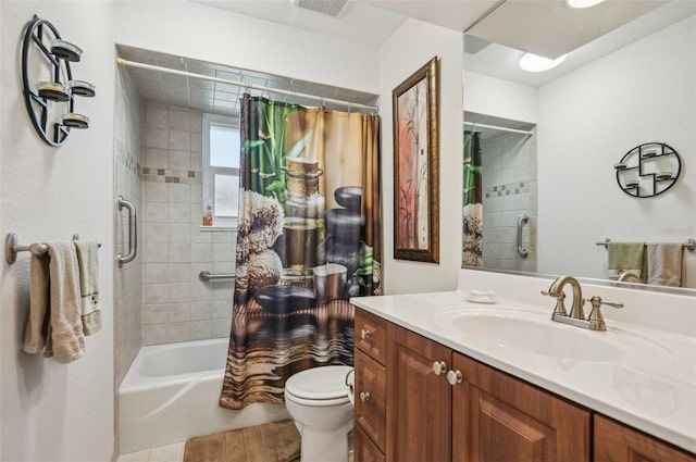 full bathroom with vanity, shower / bath combination with curtain, and toilet