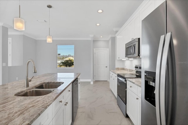 kitchen with pendant lighting, light stone counters, white cabinetry, and appliances with stainless steel finishes