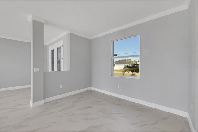 spare room featuring ornamental molding