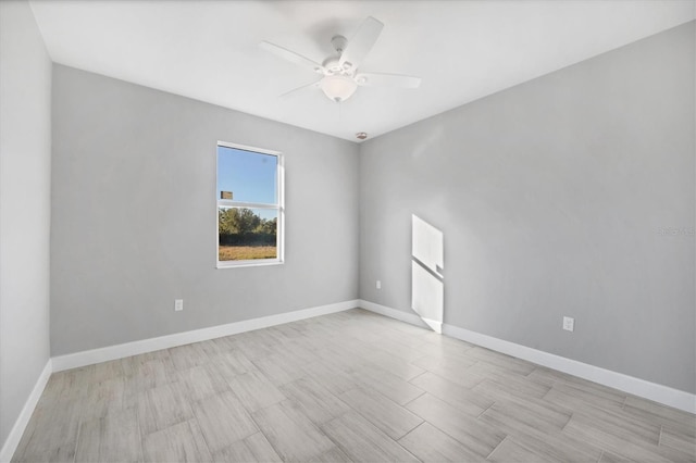 spare room featuring ceiling fan