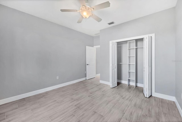 unfurnished bedroom featuring a closet and ceiling fan