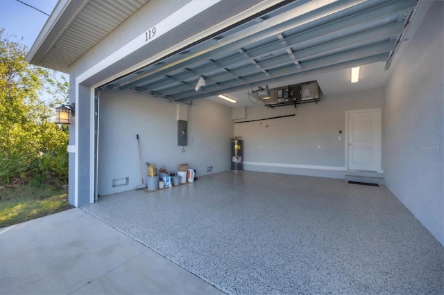 garage with electric panel, a garage door opener, and water heater