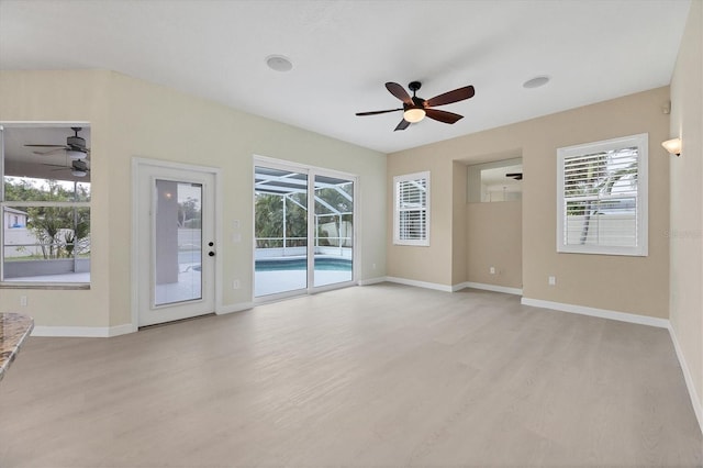 unfurnished room featuring ceiling fan and light hardwood / wood-style floors