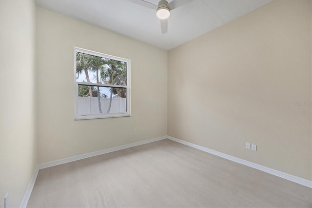 unfurnished room featuring hardwood / wood-style flooring and ceiling fan