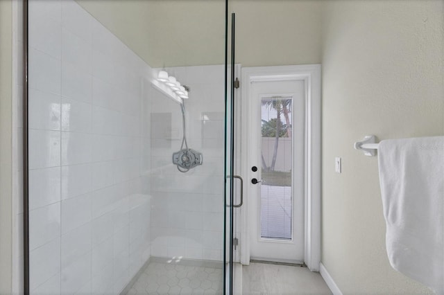 bathroom with an enclosed shower