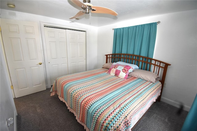 bedroom with dark colored carpet, a closet, and ceiling fan