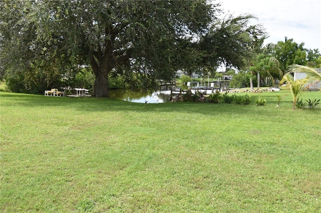 view of yard with a water view