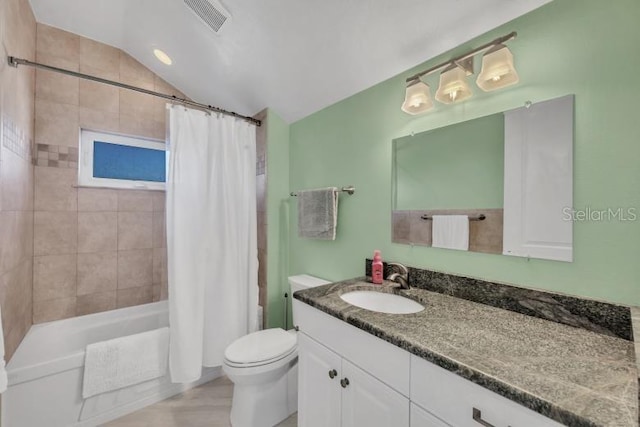 full bathroom featuring vanity, toilet, shower / tub combo, and vaulted ceiling