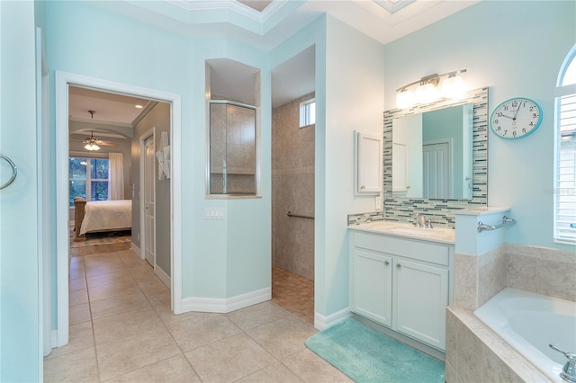 bathroom featuring vanity, tile patterned floors, ornamental molding, independent shower and bath, and tasteful backsplash