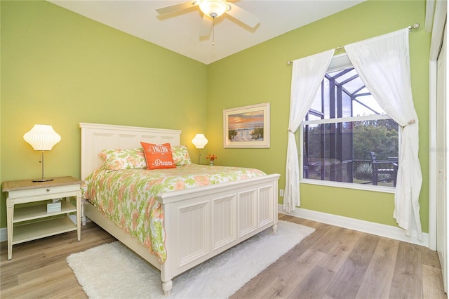 bedroom featuring light hardwood / wood-style flooring and ceiling fan