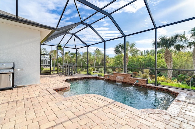 view of pool featuring pool water feature, a lanai, area for grilling, and a patio area