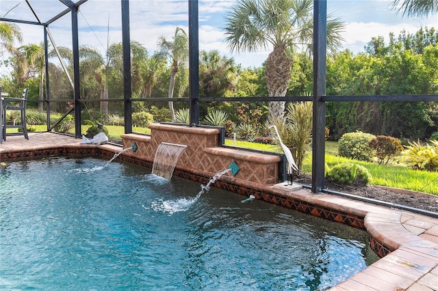 view of pool featuring pool water feature and a lanai