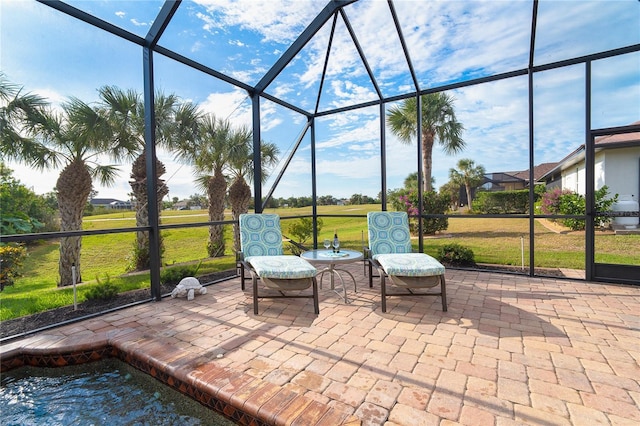 view of patio / terrace with glass enclosure