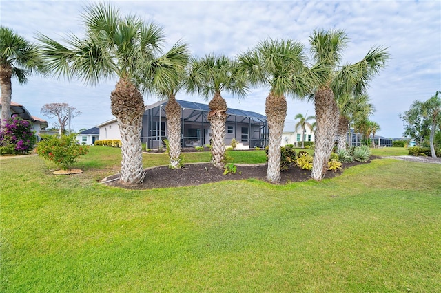 view of yard with a lanai