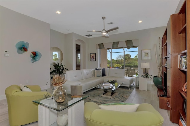 living room featuring ceiling fan