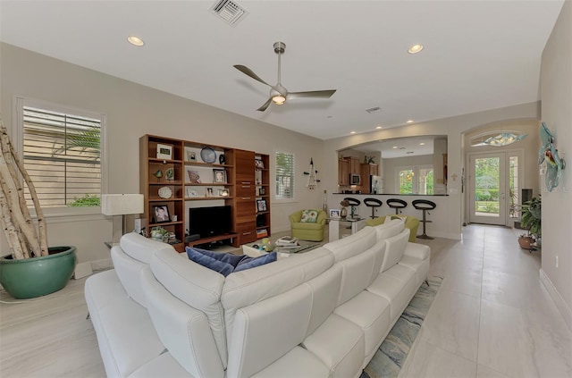 living room with ceiling fan