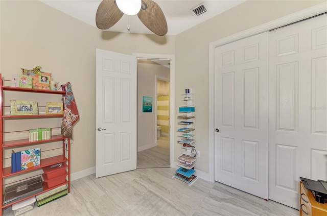 bedroom featuring a closet and ceiling fan