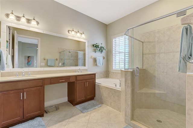 full bath with double vanity, a bath, tile patterned floors, a shower stall, and a sink