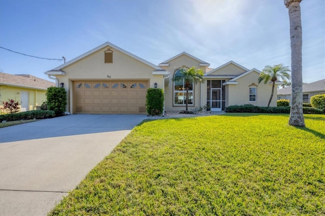 ranch-style home with a front lawn and a garage