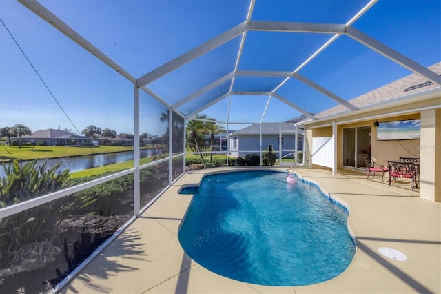 view of pool featuring a water view, a patio area, and a lanai