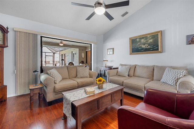 living room with hardwood / wood-style flooring, ceiling fan, and lofted ceiling