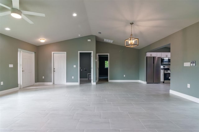 unfurnished room with ceiling fan and lofted ceiling