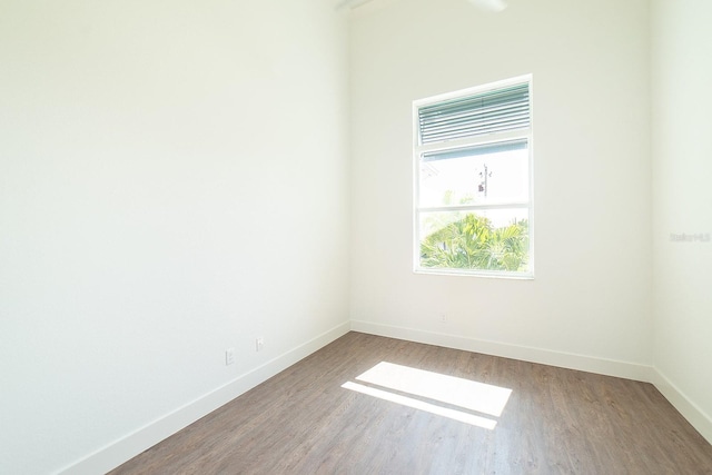 empty room featuring hardwood / wood-style floors