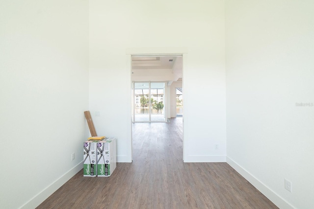 corridor featuring hardwood / wood-style floors