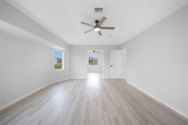 spare room with light hardwood / wood-style floors