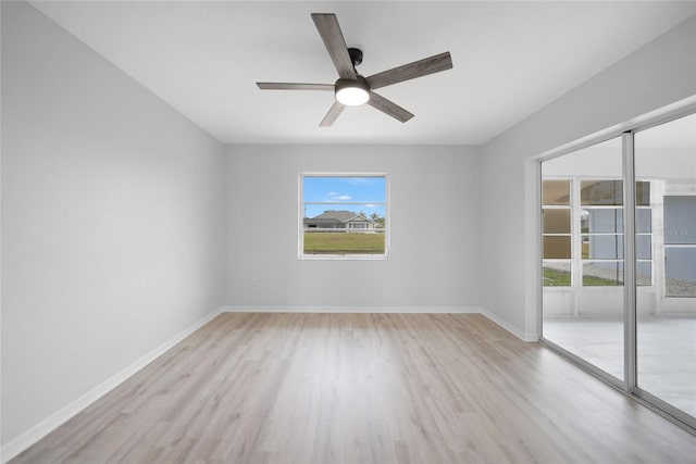 unfurnished room featuring light hardwood / wood-style flooring and ceiling fan