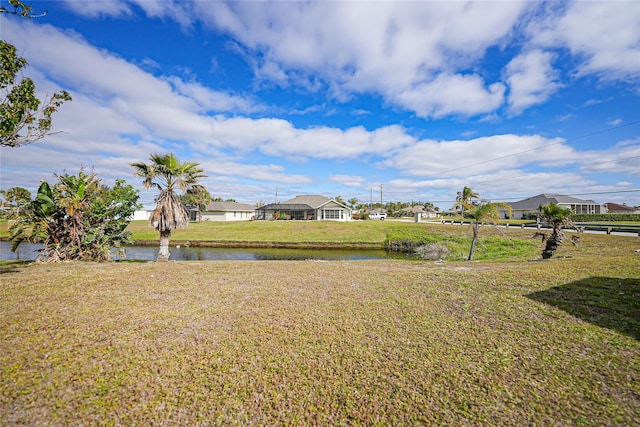 view of yard with a water view