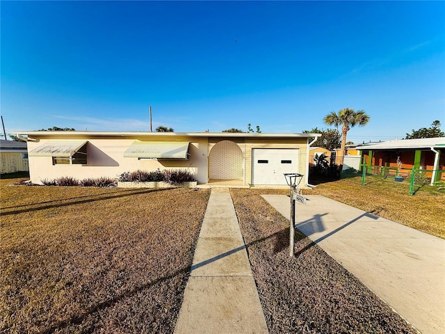 view of front of property with a front lawn