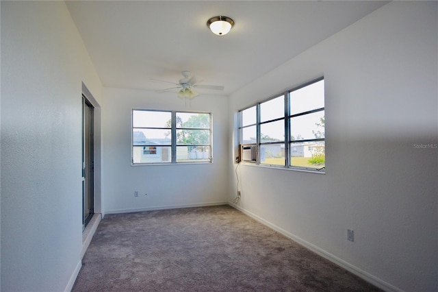 unfurnished room featuring carpet, ceiling fan, and cooling unit