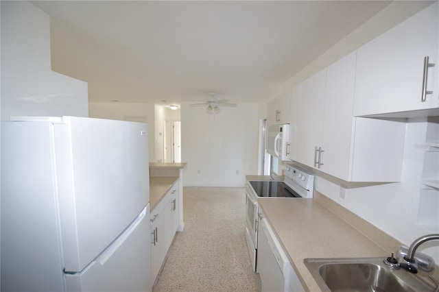 kitchen featuring ceiling fan, white cabinetry, white appliances, and sink