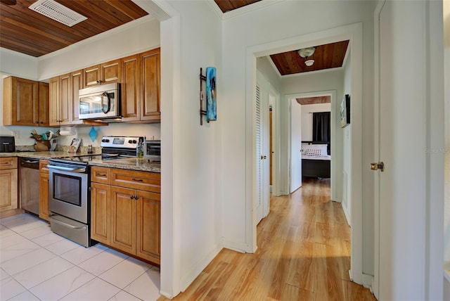 kitchen featuring crown molding, light stone counters, wooden ceiling, and stainless steel appliances