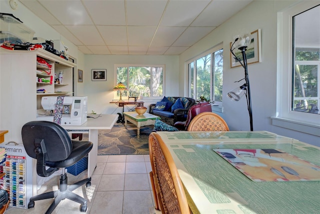 interior space with a drop ceiling