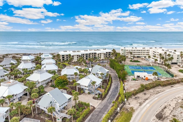 aerial view featuring a water view and a view of the beach