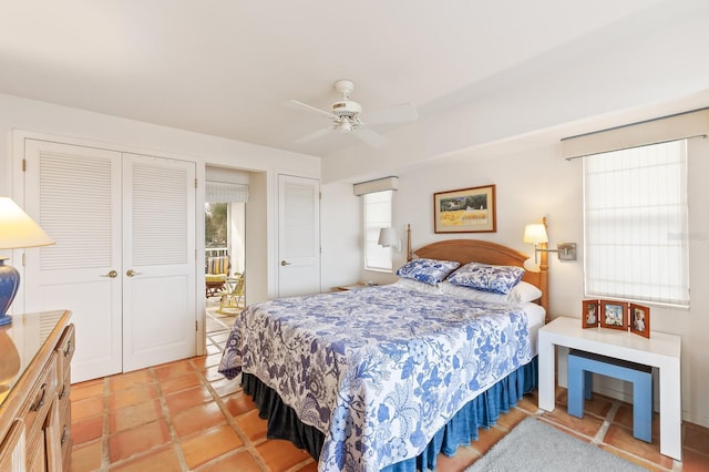 bedroom featuring ceiling fan and light tile patterned floors