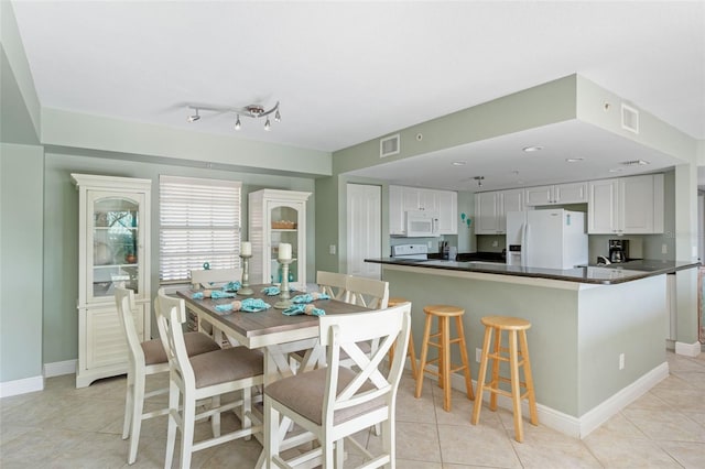 view of tiled dining room