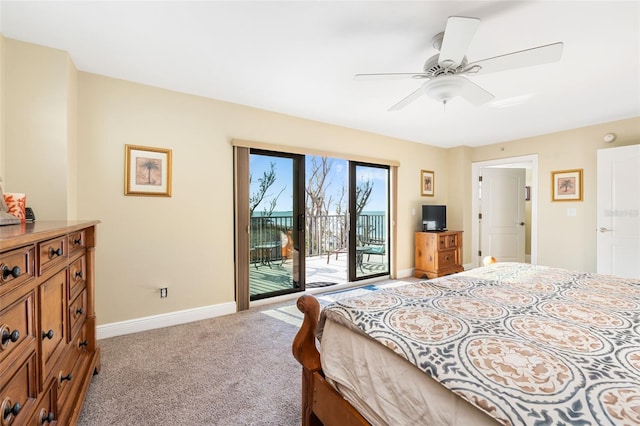 carpeted bedroom featuring ceiling fan and access to exterior