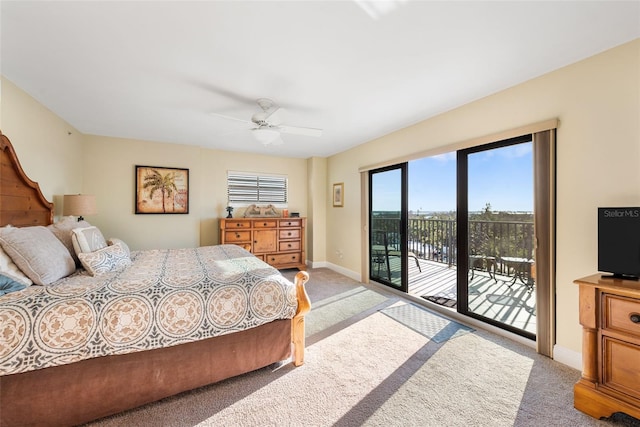 bedroom featuring ceiling fan, access to exterior, and light carpet