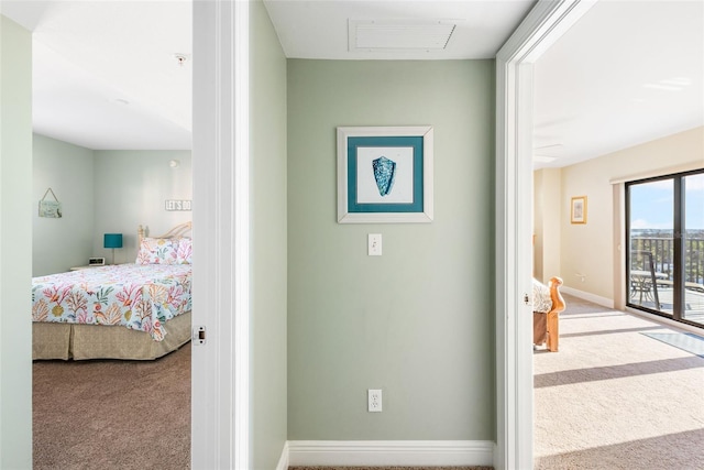 carpeted bedroom featuring access to outside