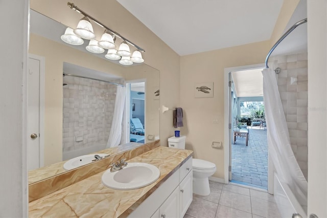 full bathroom featuring baseboards, toilet, shower / tub combo with curtain, tile patterned flooring, and vanity