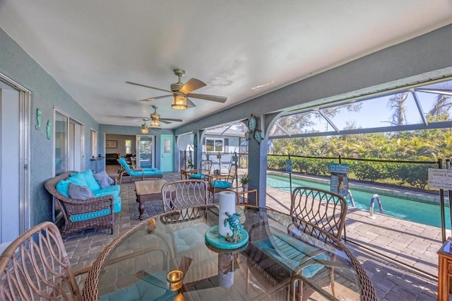 sunroom / solarium with a swimming pool