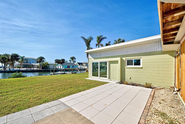 view of patio with a water view