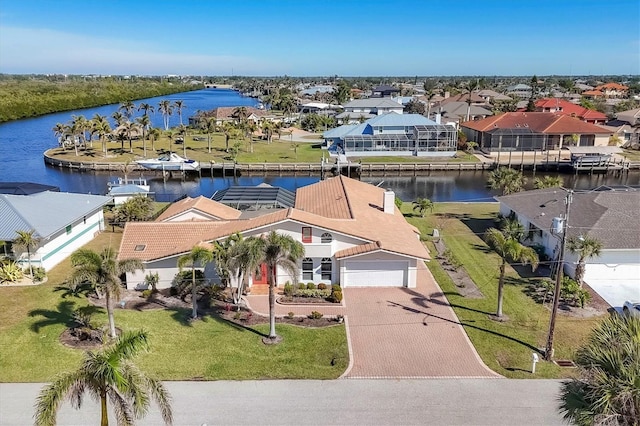 drone / aerial view with a water view