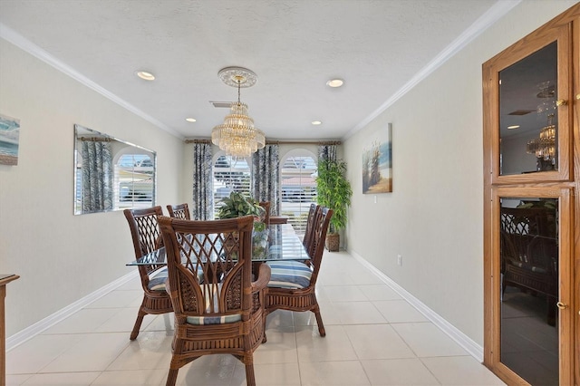 dining room featuring light tile patterned floors, crown molding, and a chandelier