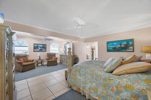 tiled bedroom featuring ceiling fan and crown molding