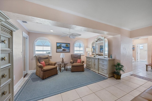 living area with ceiling fan, light tile patterned floors, and ornamental molding